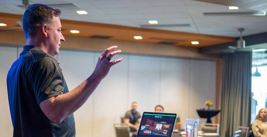 National Speaker Casey Hiers presenting to a room full of dentists