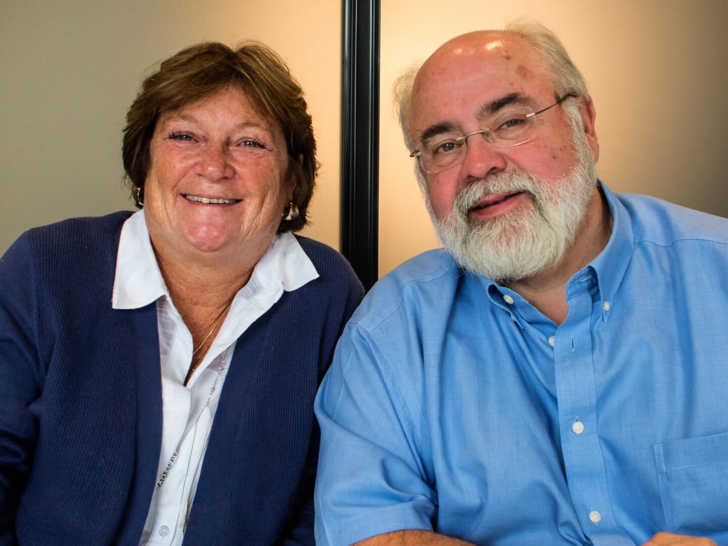 Dr. Dave and Mary Kay Butler smiling at their yearly planning meeting at Four Quadrants Advisory.