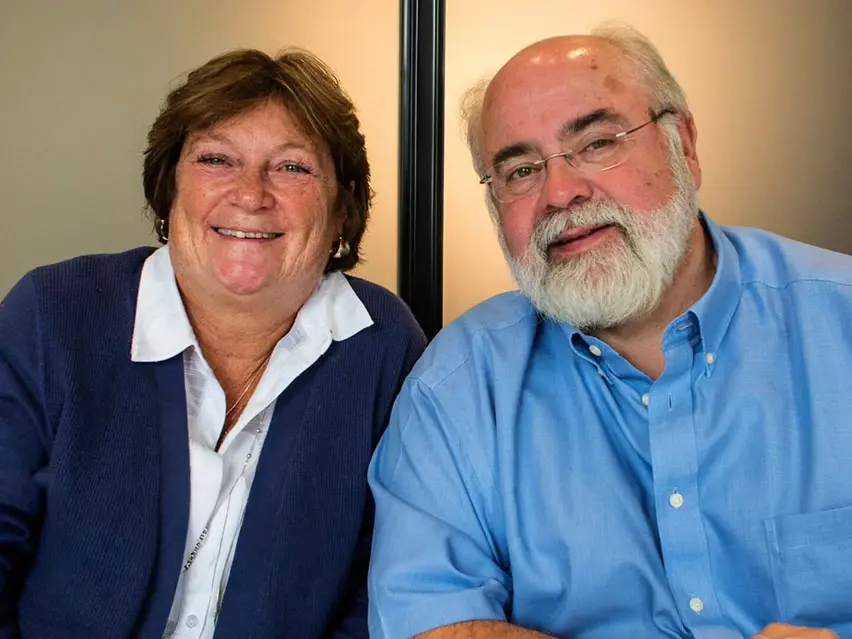Dr. Dave and Mary Kay Butler smiling at their yearly planning meeting at Four Quadrants Advisory.