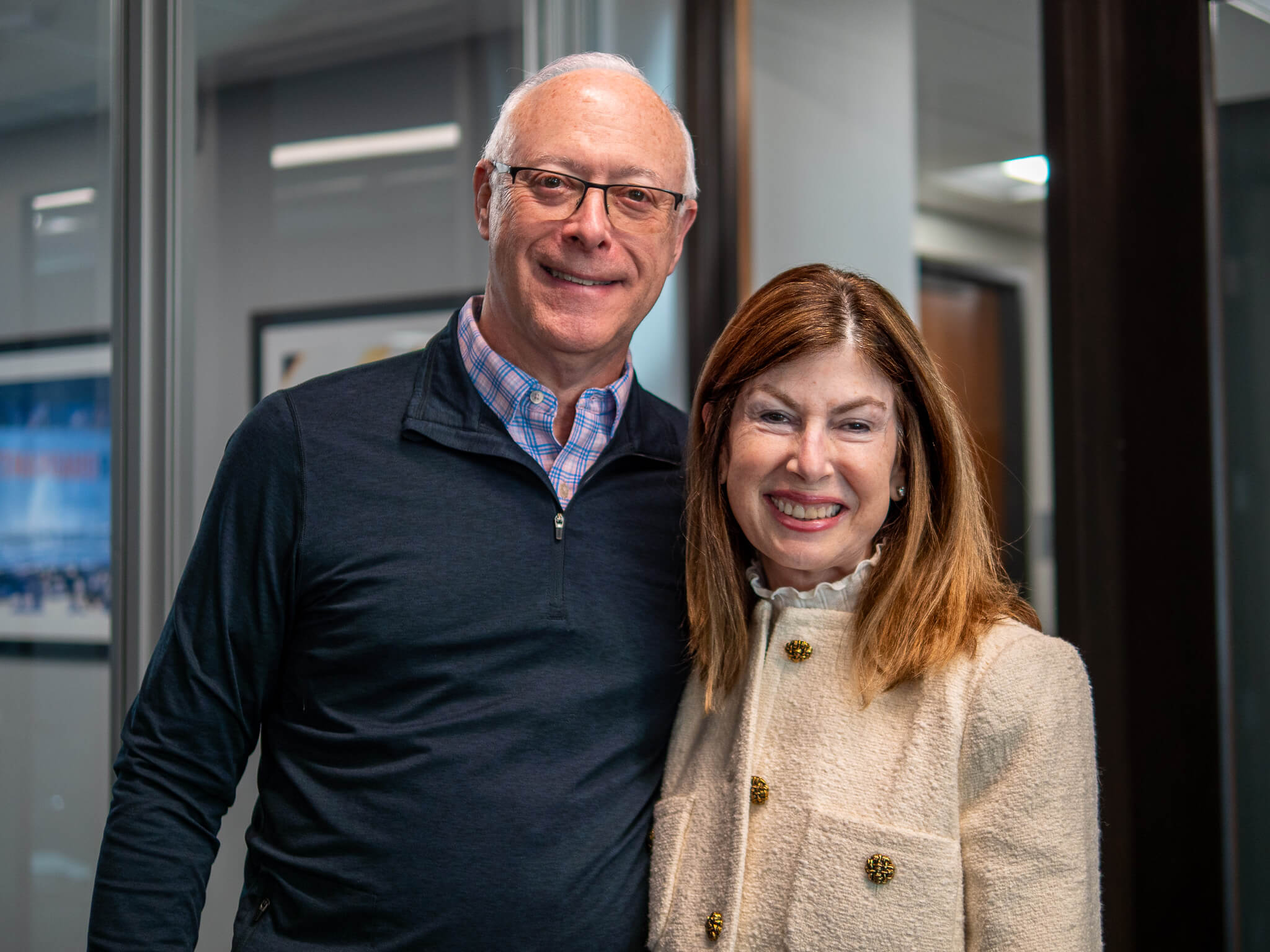 Dr. Larry and Suzy Falender smiling at their yearly planning meeting at Four Quadrants Advisory.