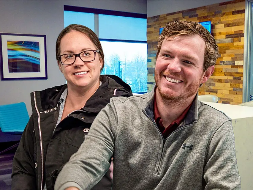 Dr. Brent and Kim Habecker smiling at their yearly planning meeting at Four Quadrants Advisory.
