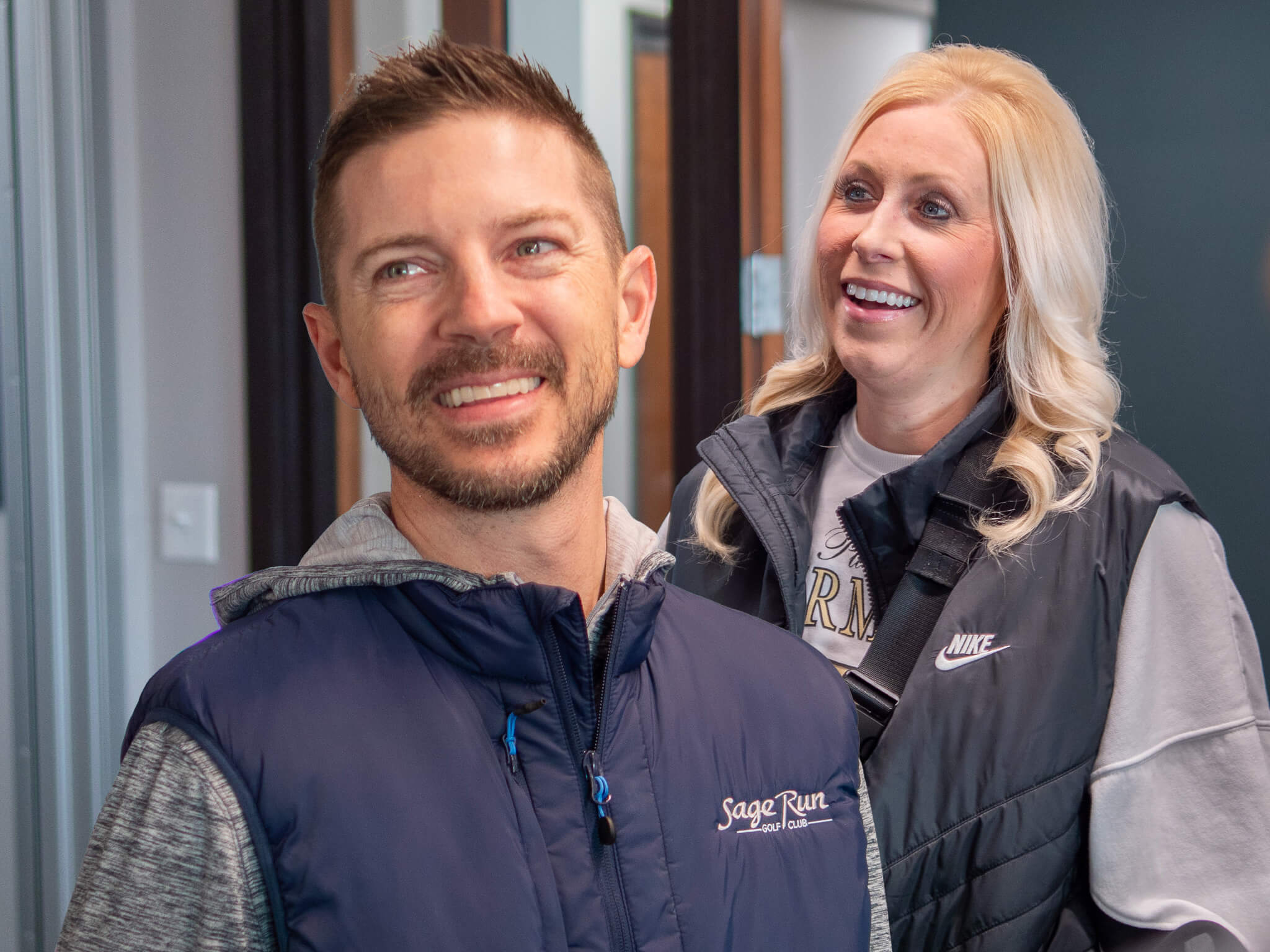 Dr. James and Michelle Huseman smiling at their yearly planning meeting at Four Quadrants Advisory.