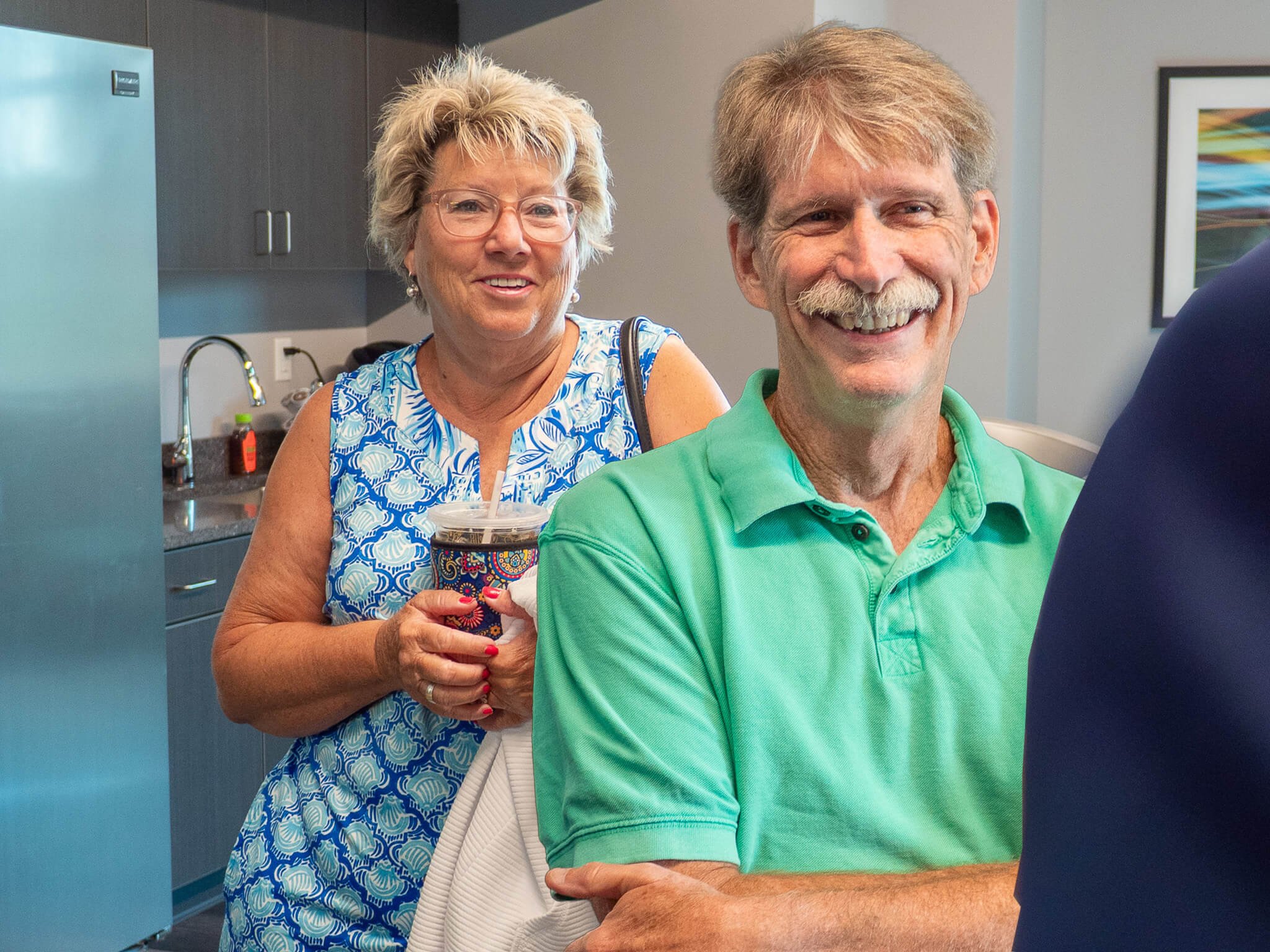 Dr. Thomas and Tamma Kennedy smiling at their yearly planning meeting at Four Quadrants Advisory.