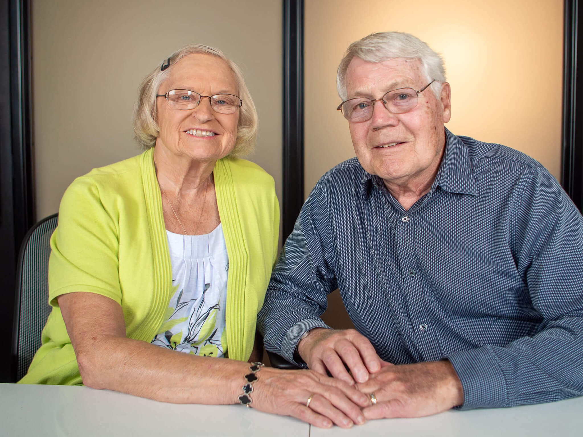 Dr. Robert and Barbara Mattern smiling at their yearly planning meeting at Four Quadrants Advisory.