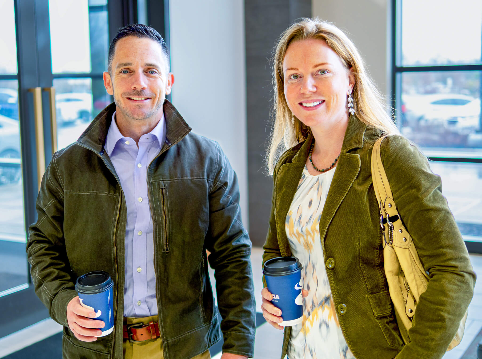 Drs. Linda and Rob Pellosie smiling at their yearly planning meeting at Four Quadrants Advisory.