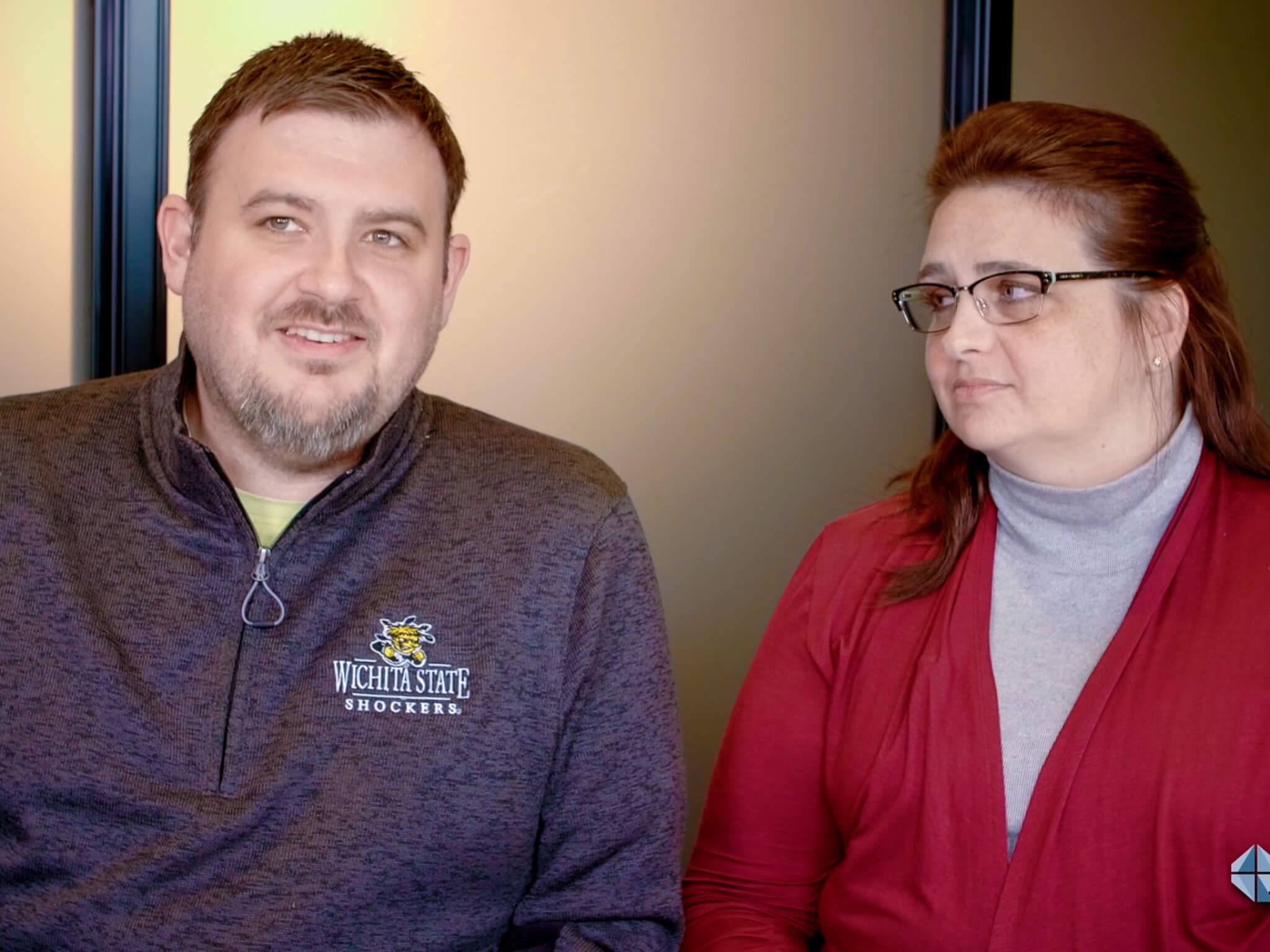 Dr. Joe and Cyndi Richardson smiling at their yearly planning meeting at Four Quadrants Advisory.