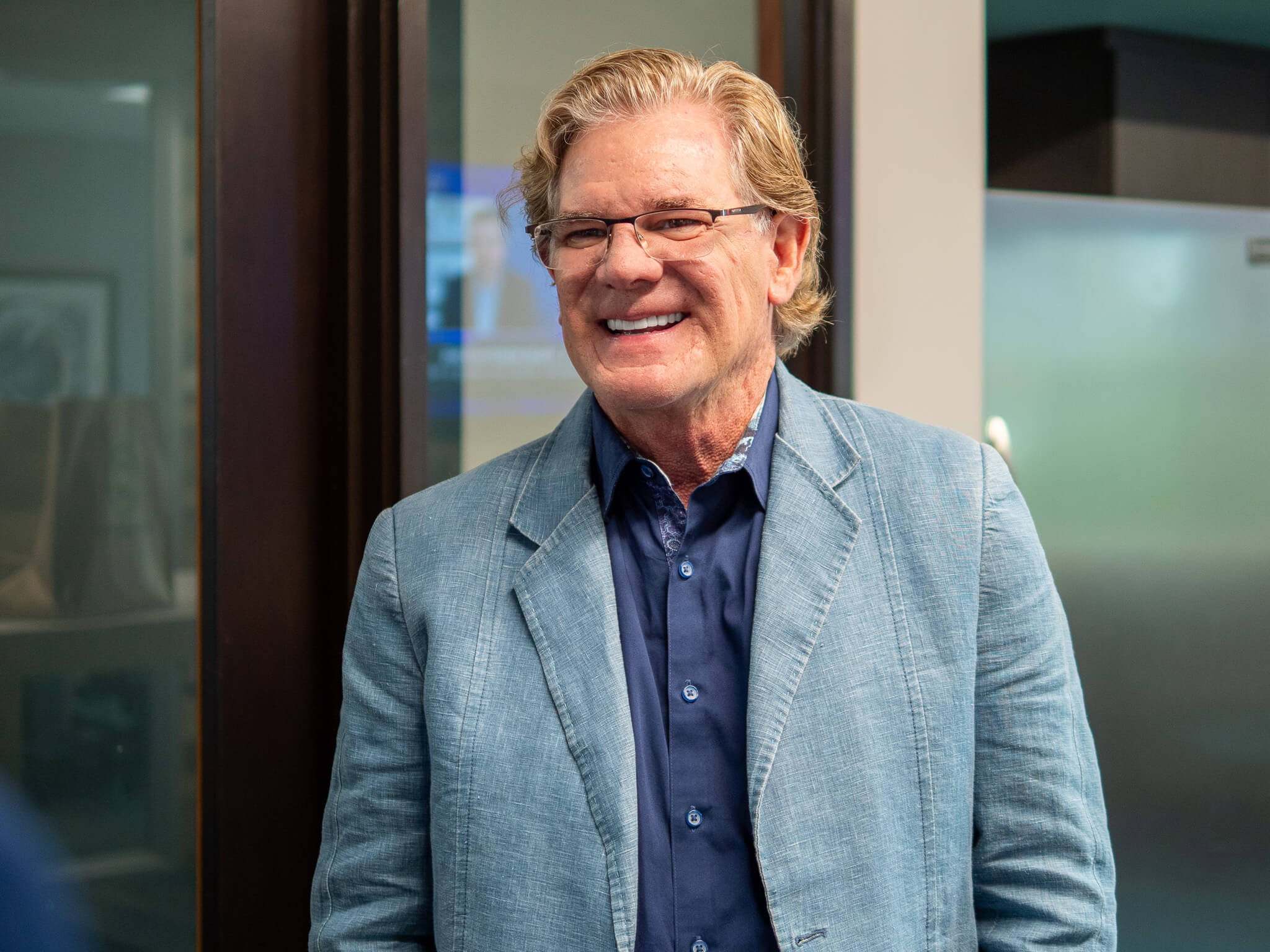 Dr. Scott Anderson smiling at his yearly planning meeting at Four Quadrants Advisory.