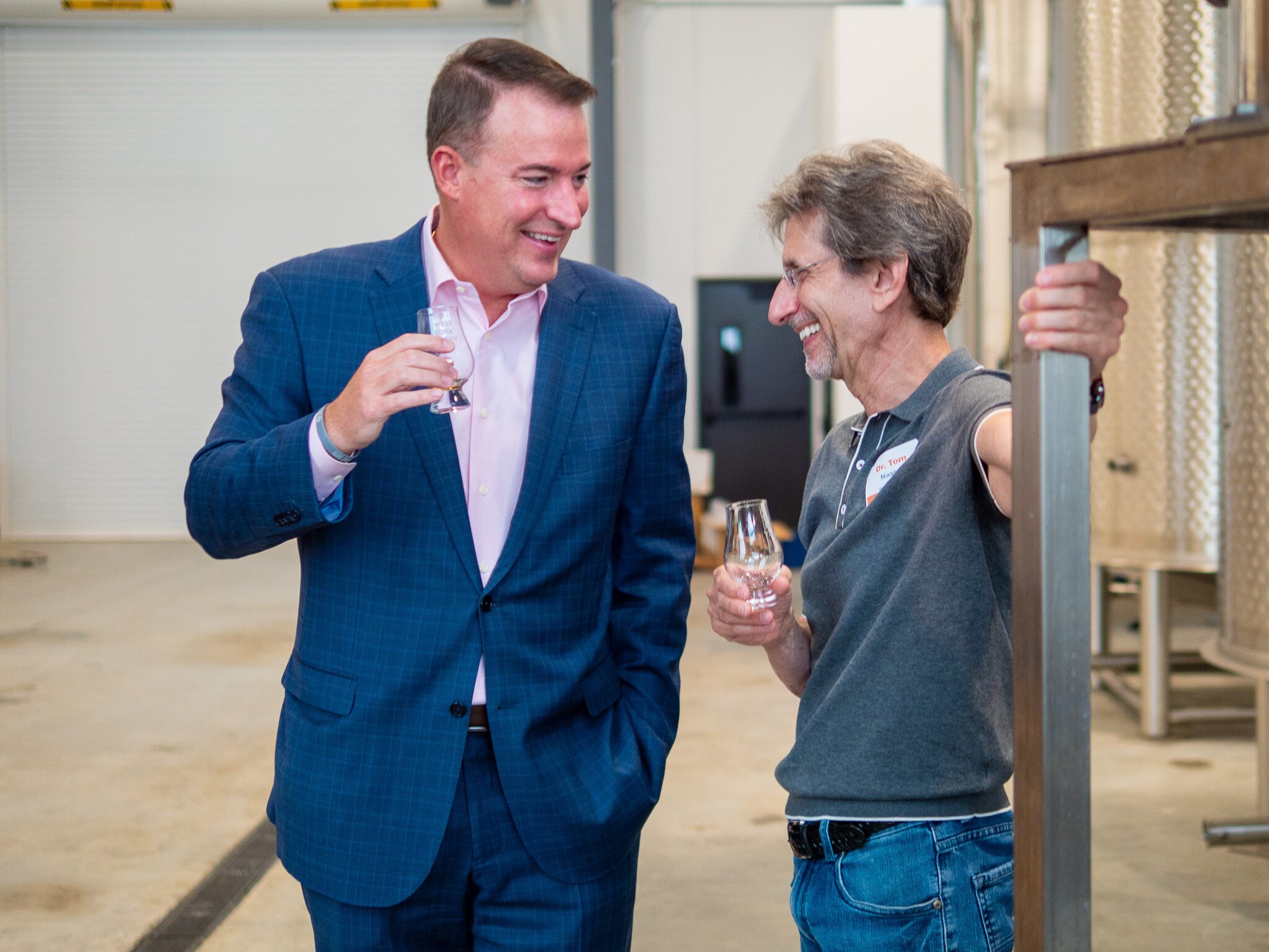 Casey Hiers and an attendee enjoying our social event for dentists.